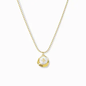 delicate chain with pearl coin compass and hammered gold charm