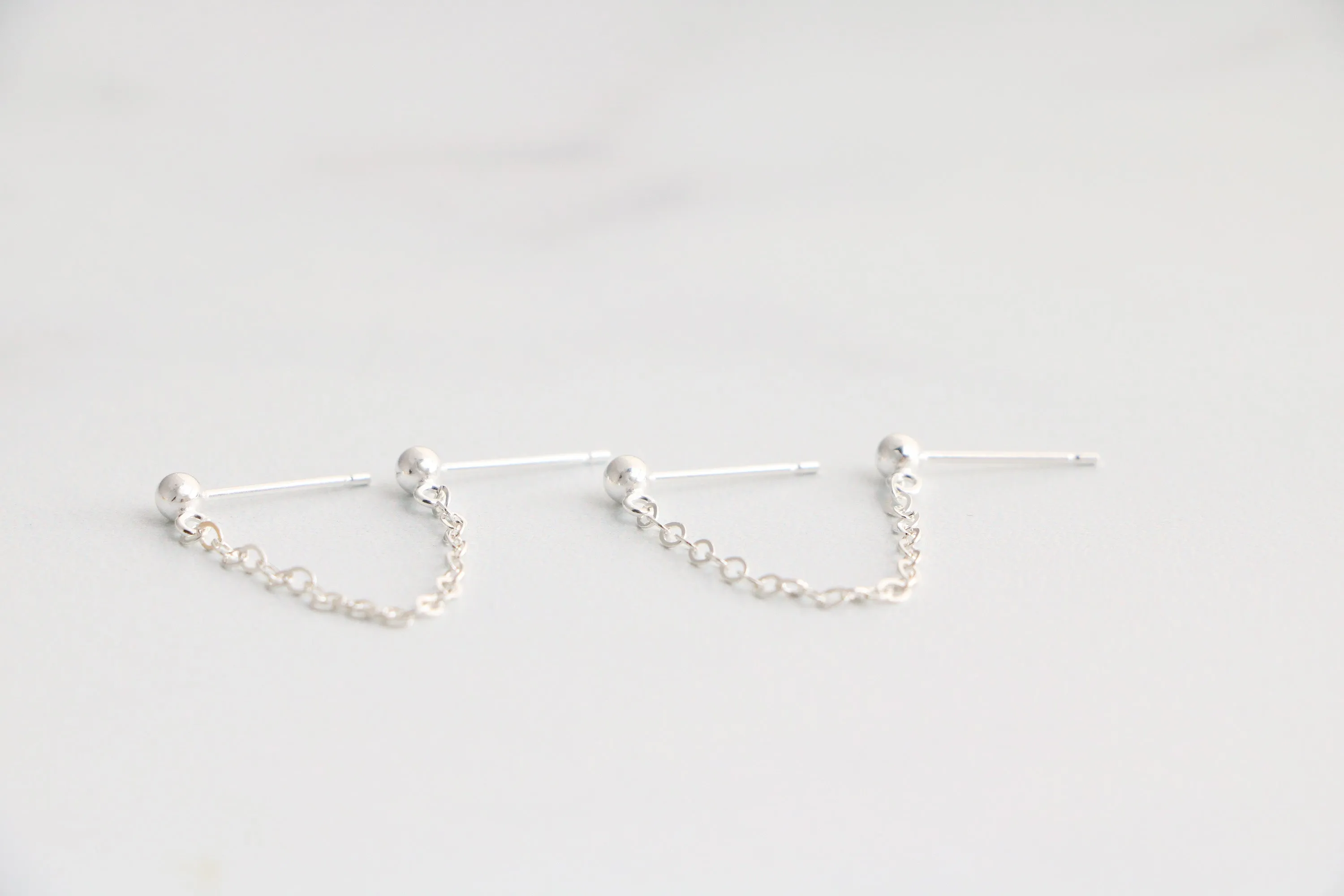 double piercing chain earrings { silver   gold }