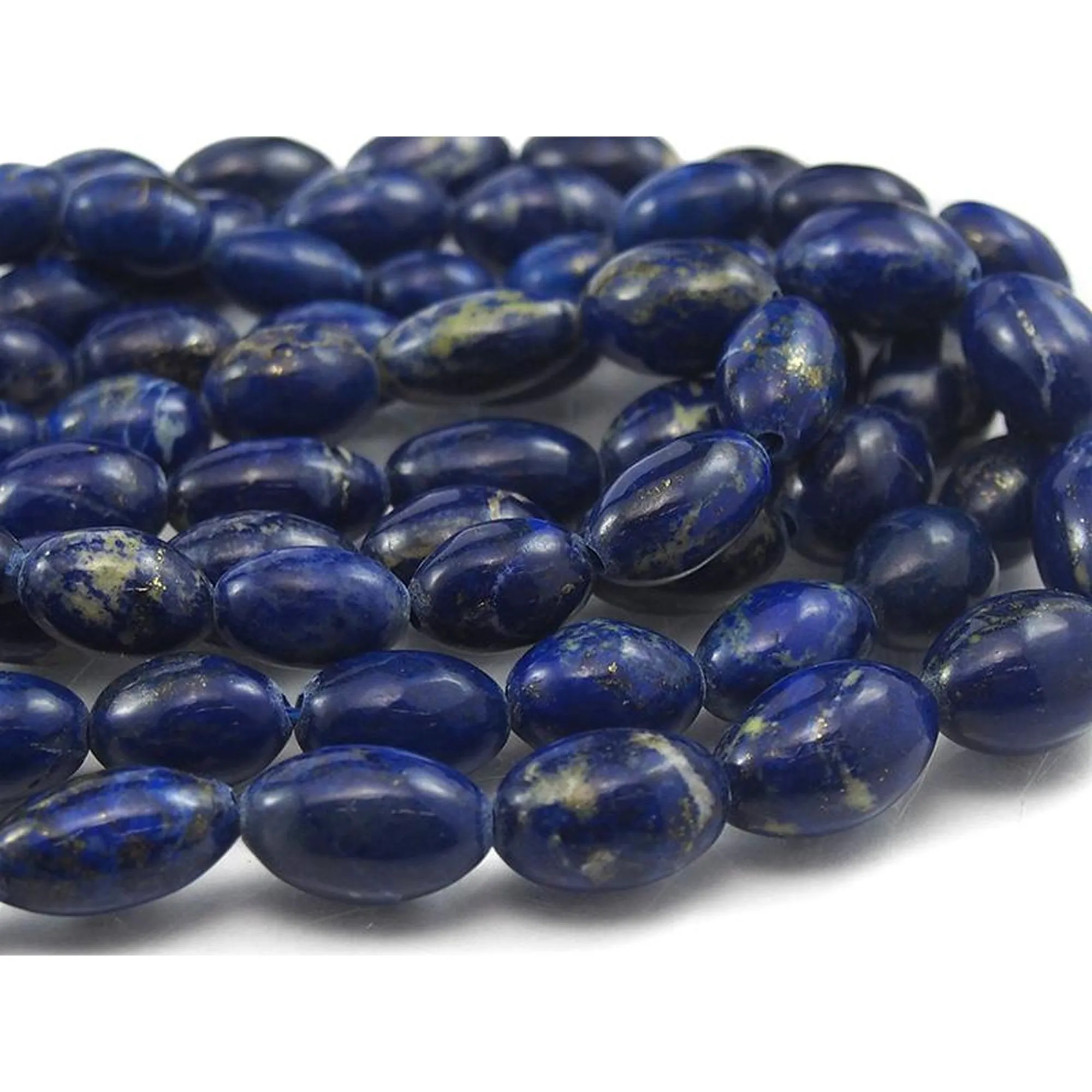 Graduated Lapis Smooth Barrel Bead Strand