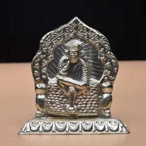 "Crafting Reverence: The Majestic Radiance of Pure Silver Sai Baba Idol"