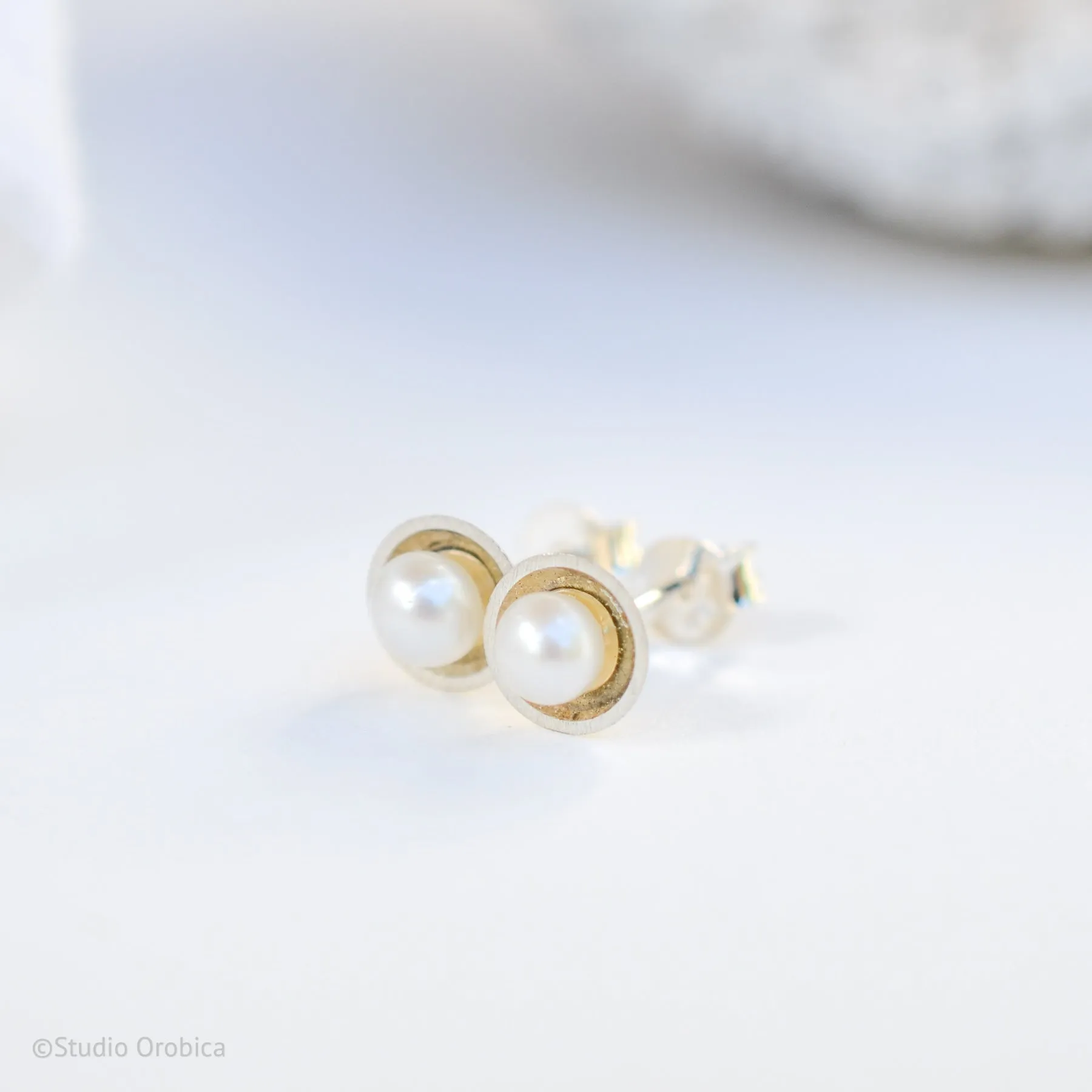 Satellite Pearl Studs by Lena Binnington