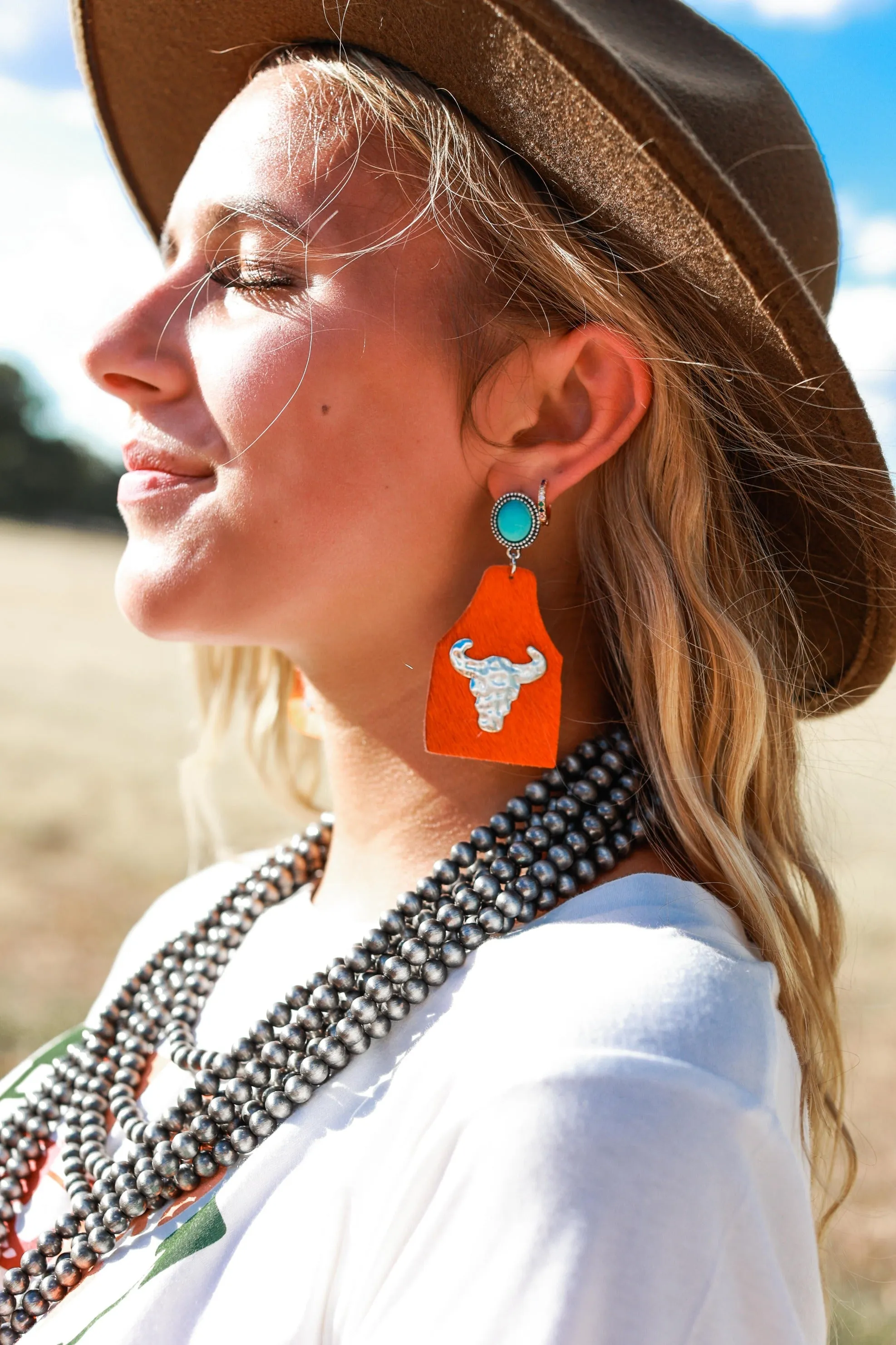 Take A Number Cowboy Orange Cowhide Copper Cow Skull Stud Earrings